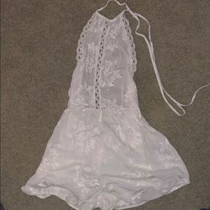 Tobi white lace romper. Never worn